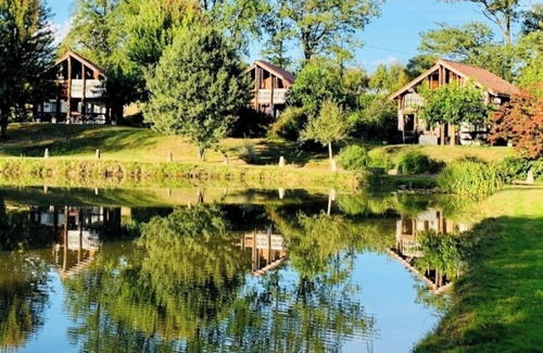 Meilhac Ski Chalet | Comfortable nature cottage, fishing pond, swimming pool and jacuzzi in season