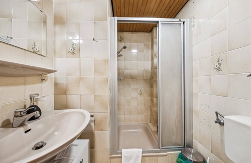 Wilhelmshaven Hotel | Comfortable room with a double and single bed, private bathroom, flat-screen TV, fridge, microwave, coffee machine, and cozy seating area. Ideal for small families or friends traveling together.