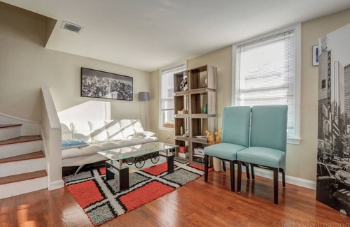 D Street - West Broadway Condo | Comfortable room with skylight in Southie