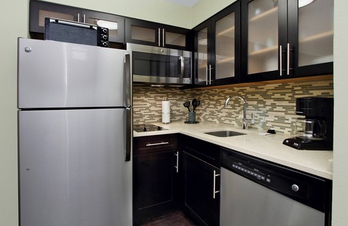 McLean Condo | Comfortable Suite with Private Patio Near DC | Free Breakfast + On-Site Fitness Center