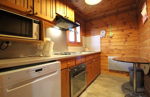Le Menil Ski Chalet | Comfortable wooden chalet with terrace tourist village, mountain views