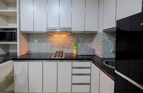 Bekasi Barat Apartment | Comfy and Modern 2BR Grand Kamala Lagoon Apartment By Travelio