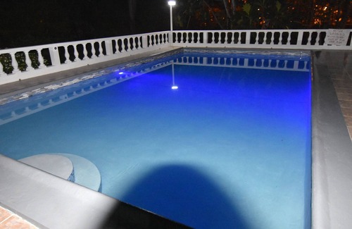 Mammee Bay Villa | Comfy bedrooms minutes away from beach, free WIFI, spa hut, BBQ,24-hour security