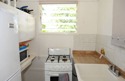 Mammee Bay Estates Apartment | Comfy bedrooms with swimming pool plus free wifi, spa hut, bbq, 24-hour security