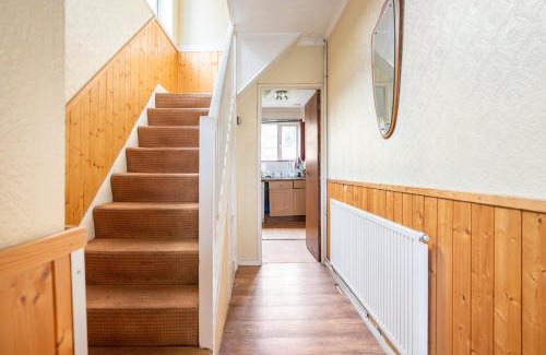 New Eltham House | Comfy garden view bedroom