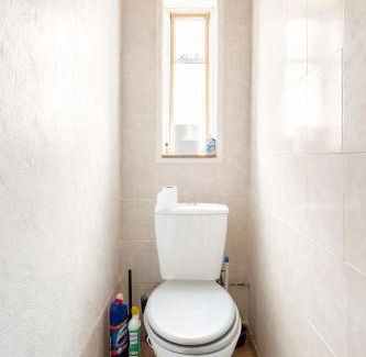 New Eltham House | Comfy garden view bedroom