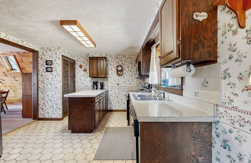 Greenville Cabin | Comfy Lakefront Cabin with Gorgeous Views, Private Dock & Pebble Beach
