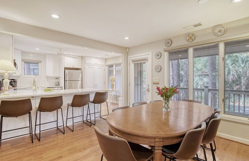 West Beach Cottage | Community pool, dock, river views!