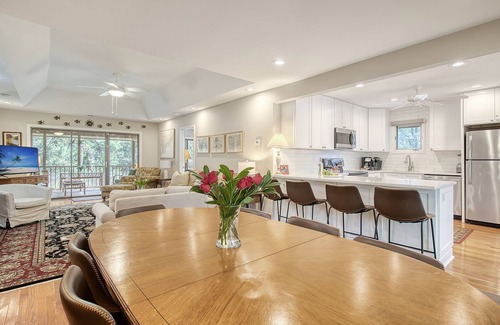 West Beach Cottage | Community pool, dock, river views!