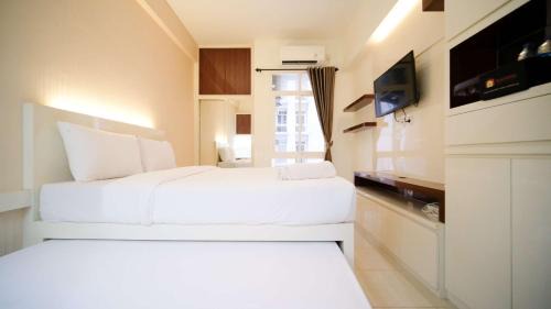 Surabaya Apartment | Compact and Cozy Stay Studio at Bale Hinggil Apartment By Travelio