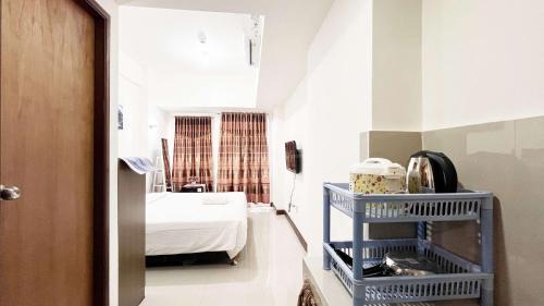 Panakkukang Apartment | Compact Studio Room Apartment Vida View Makassar By Travelio