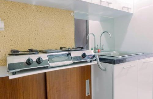 Surabaya Apartment | Compact Studio Room at Tamansari Papilio Apartment By Travelio