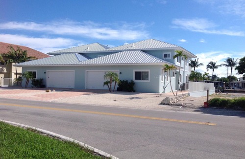 Key Colony Beach House | Compelling Canal Home with Pool & Large Dock on each side-Cabana Club Included