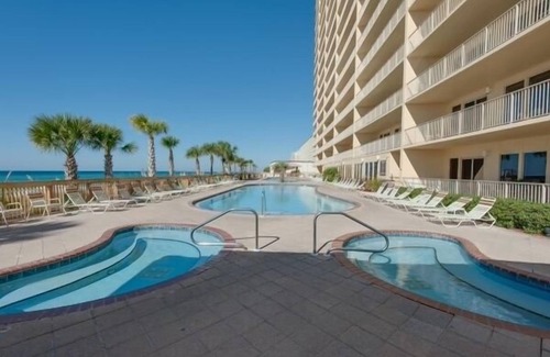 Thomas Drive Condo | Completely renovated, huge balcony ocean front condo/beach chairs + umbrella!