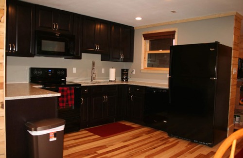 Snowshoe House | Completely Renovated Treetop Townhome Next To Village and Slopes.
