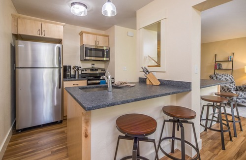 Big Sky Condo | Condo w/amazing location, updated decor, fireplace & private balcony - Cozy Stillwater Escape