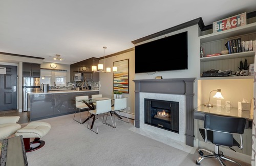 Boyne City Condo | Condo with Lake Charlevoix Views | Private Beach Access | Gas Log Fireplace