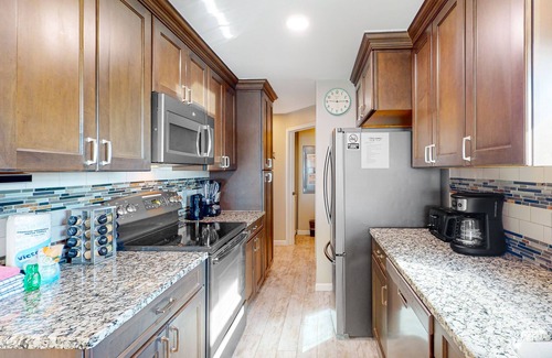 Fort Walton Beach Condo | Condo with sweeping panoramic views of the Gulf, two beach chairs & umbrella