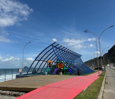 Boicucanga Beach House | Condomínio pé na areia, super novo e confortável.