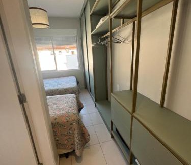 Boicucanga Beach House | Condomínio pé na areia, super novo e confortável.