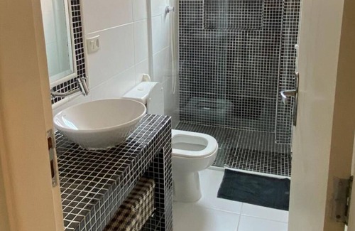 Tombo Apartment | Confort Guarujá Praia Tombo 2 bedrooms 3 air cond wifi 5 min beach elevated garage