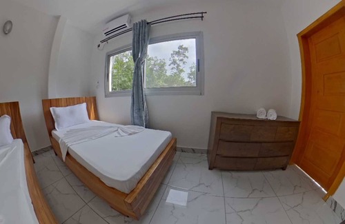 Kribi Hotel | Connecting rooms (2) Families (4 P) River balcony
