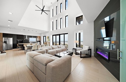 Miramar House | Contemporary beachfront, pet friendly, hot tub, elevator, private boardwalk
