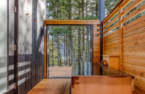 Stevenson Cabin | Contemporary cabin with river/forest views, geothermal hot tub & outdoor shower