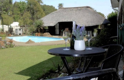 Newcastle House | Contemporary Gem: Studio with Serene Pool Viewn