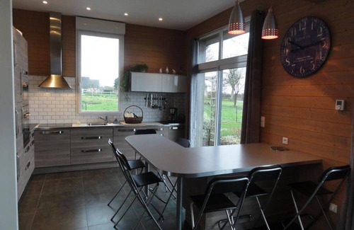Dragey-Ronthon Cottage | Contemporary house with enclosed garden, terrace and bay views