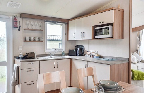 Dolgellau House | Contemporary, stylish caravan with one double and one twin.