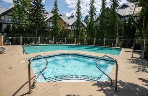 Village North House | Convenient Village Location with Pool and Hot Tub