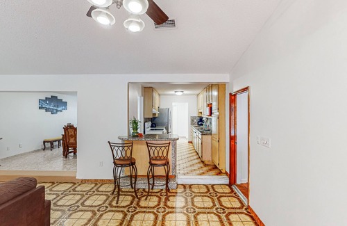 Orient Park House | Conveniently located home with private pool, patio, foosball, & private W/D