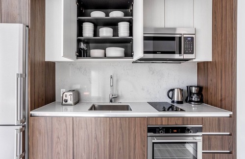 Seaport District Apartment | Cool Seaport Studio w/Fitness, close to Shopping & Dining, by Blueground