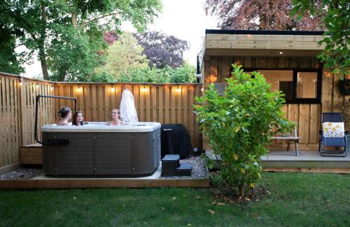 Toppesfield House | Copper Beech Lodge with Hot Tub, Games Room, Fire Pit