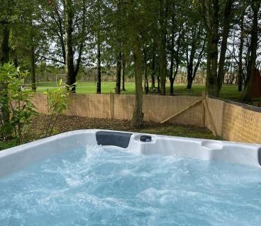 Toppesfield House | Copper Beech Lodge with Hot Tub, Games Room, Fire Pit