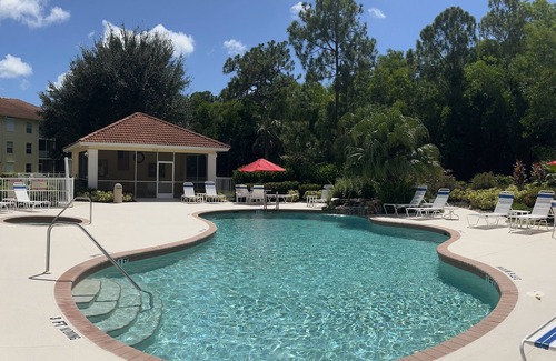 Naples Condo | Coral Falls Resort BRAND NEW Designer Coastal Condo Lely Resort