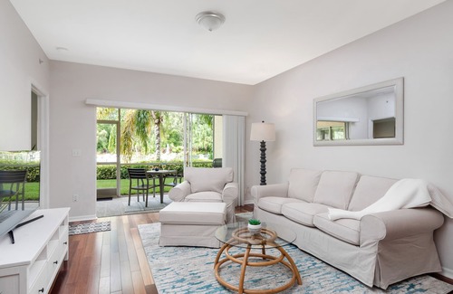 Ole Condo | CORAL FALLS - Updated Coastal Condo with Waterfall Pool Views