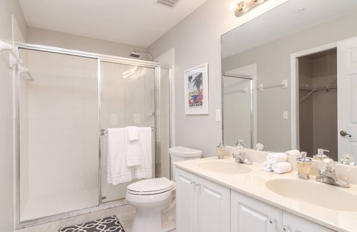 Ole Condo | CORAL FALLS - Updated Coastal Condo with Waterfall Pool Views