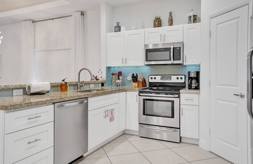 South Corals House | Coral Reef Villa – 3BR/2BA with Heated Pool, Grill & Private Patio