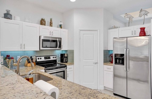 South Corals House | Coral Reef Villa – 3BR/2BA with Heated Pool, Grill & Private Patio