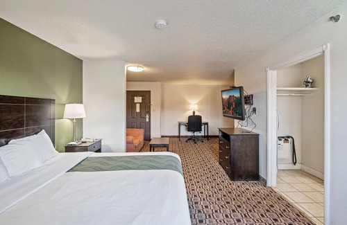 Wichita Hotel | Coratel Plus Deluxe Suite 1 King Bed with Sofa Non Smoking Oversized