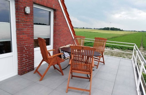 Dornum Apartment | Core-serviced apartment directly on the small dike for up to 3 people