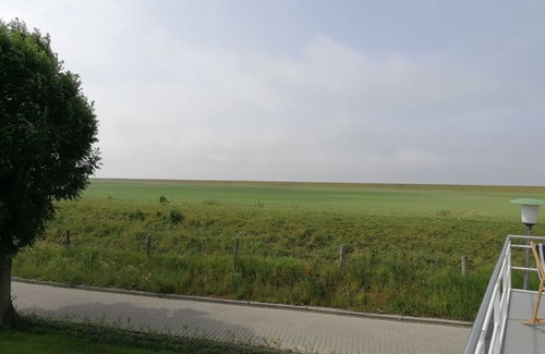 Dornum Apartment | Core-serviced apartment directly on the small dike for up to 3 people