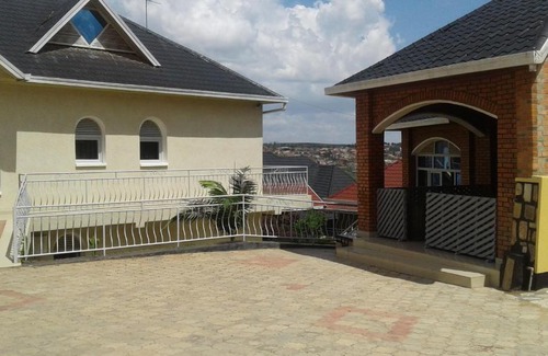 Kigali House | Corina by Macchiato Suites