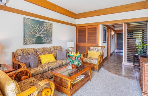 Poipu House | Corner condo with garden view, lanai, pool & hot tub - walk to Kiahuna Beach