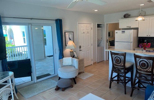 Wheeland Settlement Condo | Corner Ground Floor Oceanfront/Stunning Ocean Views & Easy Beach Access.