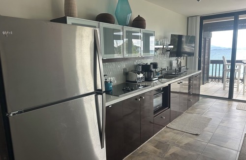 Red Hook Condo | Corner Suite "Glass House on the Sea" Modern Luxury on Sapphire Beach