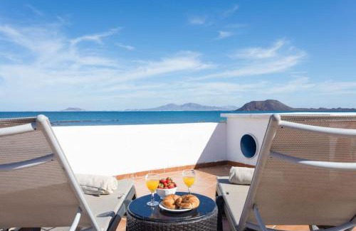 Corralejo Villa | Corralejo Beachfront Villa Remos with Lobos Island View, Private Pool, Wifi & BBQ by Amazzzing Travel