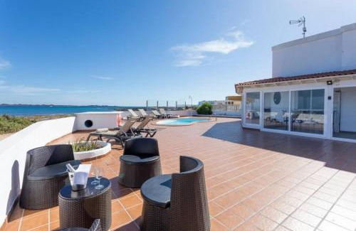 Corralejo Villa | Corralejo Beachfront Villa Remos with Lobos Island View, Private Pool, Wifi & BBQ by Amazzzing Travel